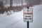 No Trespassing: Active Rail Line on sign in winter