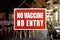 No Vaccine No Entry Sign at a restaurant or indoor cafe. Proof or vaccination required to enter a shop or business establishment