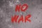 No war text graffiti on grunge wall