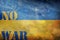 no war in written on ukrainian retro flag with grunge texture. Stop conflict between Ukraine and russia. Banner against war in