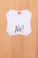 NO - White Sticky Notes with Written Word NO, Pinned to the Wooden Message Board