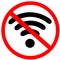 No Wifi connection. Wireless internet sign. Red prohibition warning road sign on white background.