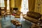 Nobel decor of Kylemore Abbey interior, beautiful vintage furniture and silverware in leaving room