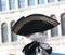 Noble man with wig and hat in the Piazza San Marco in Venice dur