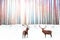 Noble red deer against a winter fantasy colorful forest. Winter Christmas image