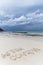 Nobody tourist and sand wording `after coved-19` on Nual beach with sandy and strom cloud sky in Larn island, Pattaya, Chinburi, T