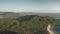 Nobody tropic islands landscapes at sea bay aerial. Green forest on mount at ocean shore. Palm trees