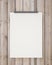 Nock up blank white hanging poster on vertical wooden planks wall, background
