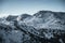 Nocky mountains in Austria getting covered in shaddow. Winter Alps during sunset.