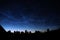 Noctilucent shining clouds on night sky