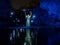 Nocturnal photography, lightpainting, representing a model in the river with shadows made with lanterns on the river