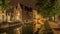 Nocturnal view of a canal in Bruges