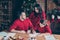 Noel evening concept. Photo of happy nice comfort charming beautiful beaming people mommy mama daddy wearing red jumpers