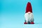 Noel gnomes elfes on blue background. Christmas greating card. Christmas or New Year celebration concept. Copy space