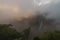 Nohkalikai Waterfall amidst clouds and setting sunlight near Cherrapunjee,Meghalaya,India