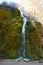 Nohn, Germany - 01 13 2021: icy moss waterfall DreimÃ¼hlenwasserfall in January