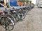 NOIDA, UTTAR PRADESH/INDIA-30 JUNE 2020 : Different types and brands Bicycle parked outside factory on service road by