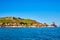 Noirmont Point from the sea in sunshine