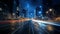 Noisy night cityscape with fast traffic on a modern highway, surrounded by tall skyscrapers and twilight sky.