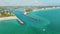 Nokomis beach with soft white sand and North and South Jetty in Sarasota county, USA. Many people enjoying vacation time