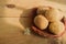 Nolen gur rosogolla or rasgulla served on plate. brown spongy bengali indian traditional sweet made from cottage cheese and