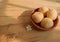 Nolen gur rosogolla or rasgulla served on plate. brown spongy bengali indian traditional sweet made from cottage cheese and