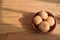 Nolen gur rosogolla or rasgulla served on plate. brown spongy bengali indian traditional sweet made from cottage cheese and