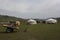 Nomadic tents and cart in Tunkhel steppe, Selenge, Mongolia.