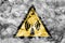Non ionising electromagnetic radiation hazard warning smoke sign. Triangular warning hazard sign, smoke background.
