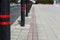 Non Parking space, red-black stripes pole. Security pole