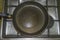 Non-stick frying pan on stainless steel gas stove. Home cooking
