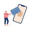 Noncontact Payment Concept. Man Buyer Character Hold Huge Credit Card Stand near Smartphone with Dollar Sign