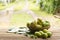 Noni fruit and noni basket on wooden table.Zoom in