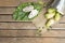 Noni fruit in tank on wooden table.Fruit for health and herb