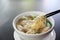 Noodle and wonton soup on a bowl