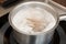 Noodles being cooked in boiling water