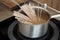 Noodles being cooked on induction stove