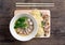 Noodles bowl on wooden background