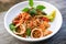 noodles plate with instant noodles stir fried with vegetables herb spicy tasty appetizing asian noodles mix seafood stir fried