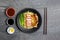 Noodles and pork soup with pork, barbecue eggs, crispy pork, dumplings, green vegetables with seasonings, healthy food, Thai,