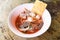 Noodles with seafood on red soup - hot and spicy thai food noodle squid pork fish ball morning glory crispy wonton skin pork and