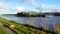 Nord-Ostsee-Kanal with cargo ship and a dog on the way near Rendsburg, Germany