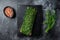 Nordic Gravlax Salmon fillet with dill. Black background. Top view