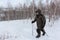 Nordic Walking -  adult man climbing to peak, mountain Bald, Bugotaksky hills, Novosibirsk region, Russia