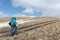 Nordic Walking - adult woman climbing on a mountain