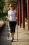Nordic walking - middle-aged woman working out