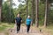 Nordic Walking senior couple with dogs