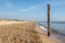 Norfolk coastline. Coastal landscape image of sea and beach at Caister East Anglia UK