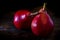 Normal view of a red pear or red battler on the table. Dark background. Organic and natural products, healthy and wholesome food