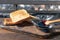 Normal view of a table with toasts, a pot with blueberry jam and another pot with fresh aranadanos. Healthy food concept